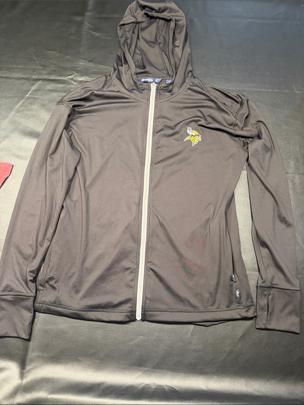 Cutter & Buck Black Hooded Full-Zip Jacket MN Vikings logo.